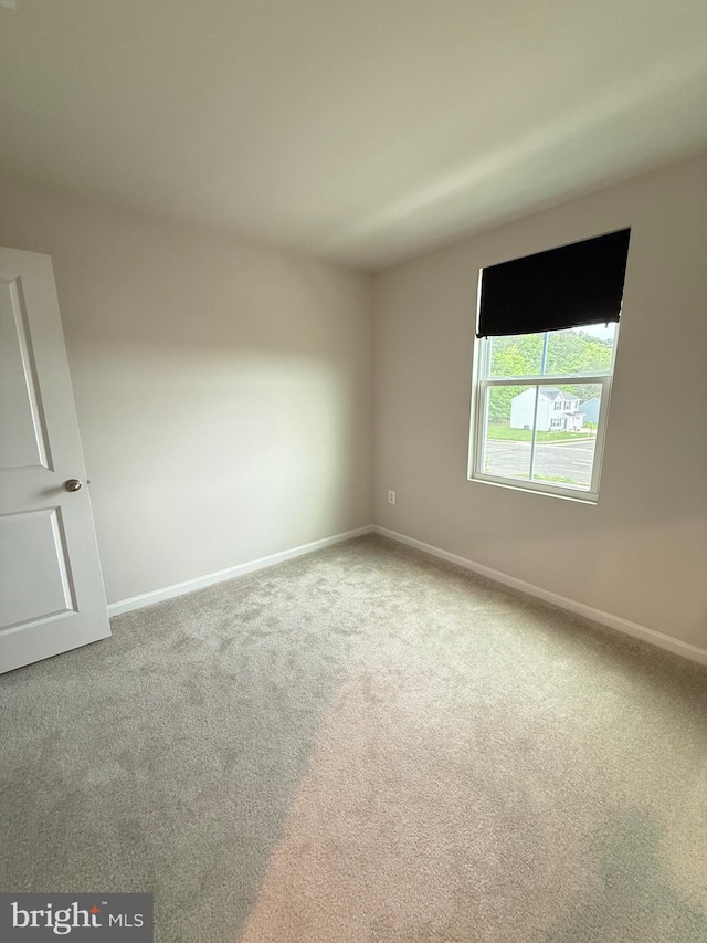 506 Red Bill Ln, Cambridge, MD 21613 - empty room featuring baseboards and carpet
