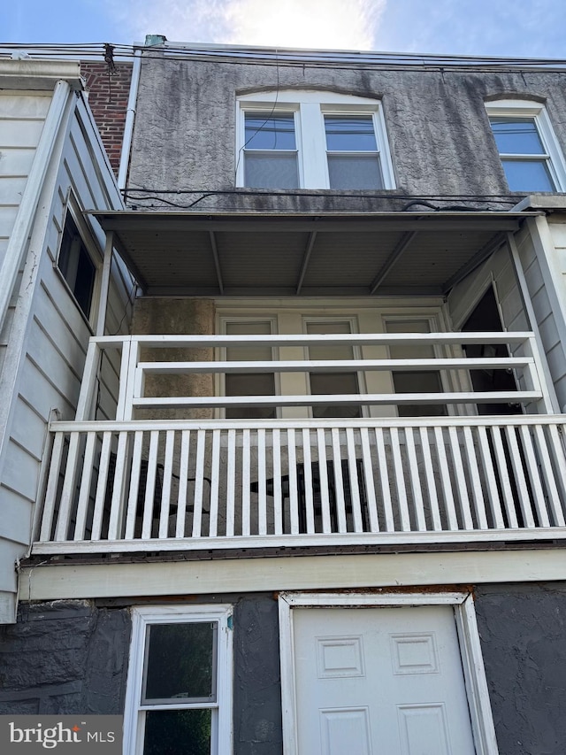 exterior space with stucco siding