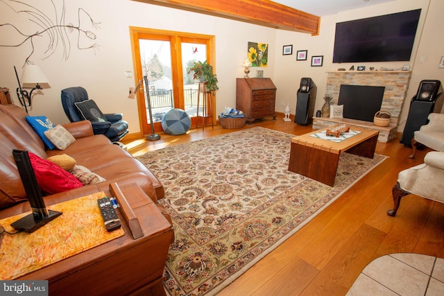 20 Eagle Ct, Gilbertsville, PA 19525 - living area with beamed ceiling, wood finished floors, and a fireplace