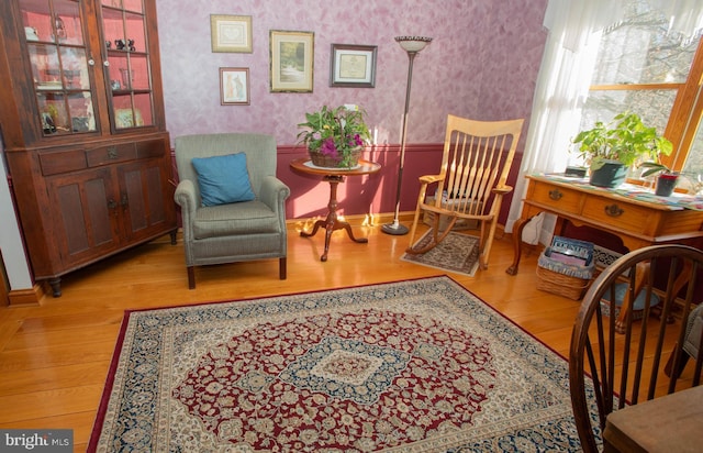 20 Eagle Ct, Gilbertsville, PA 19525 - sitting room with wallpapered walls, baseboards, and wood finished floors