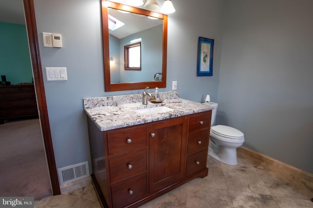 20 Eagle Ct, Gilbertsville, PA 19525 - bathroom with baseboards, visible vents, vanity, and toilet