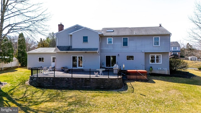 20 Eagle Ct, Gilbertsville, PA 19525 - back of house with a yard, a patio, a hot tub, and a chimney