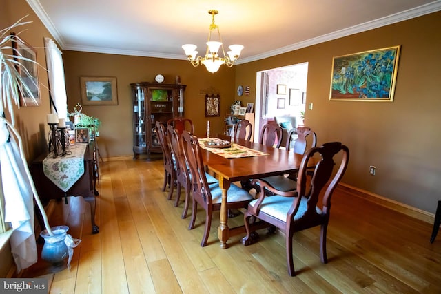 20 Eagle Ct, Gilbertsville, PA 19525 - dining area with a chandelier, light wood-style flooring, crown molding, and baseboards