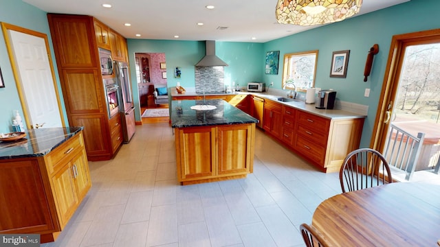 20 Eagle Ct, Gilbertsville, PA 19525 - kitchen featuring wall chimney exhaust hood, stainless steel appliances, a sink, recessed lighting, and a kitchen island