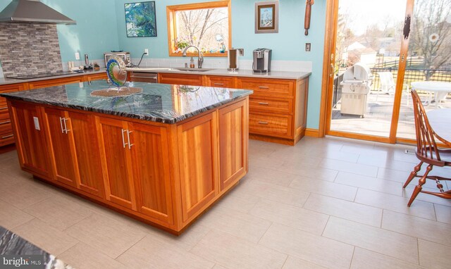 20 Eagle Ct, Gilbertsville, PA 19525 - kitchen with brown cabinets, black electric cooktop, range hood, a sink, and dark stone counters