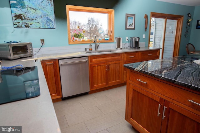 20 Eagle Ct, Gilbertsville, PA 19525 - kitchen with brown cabinets, a toaster, dishwasher, stone countertops, and a sink