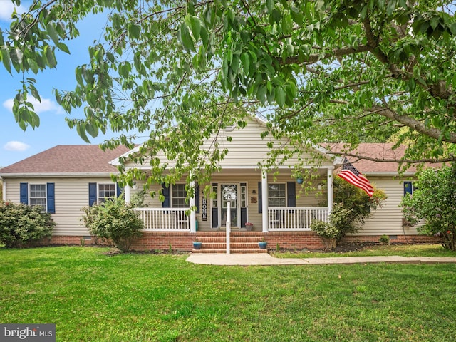 single story home featuring a porch, a front lawn, and crawl space