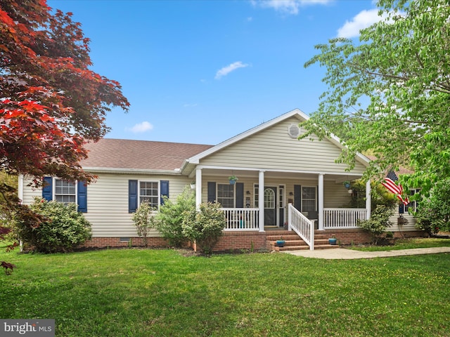 single story home with a porch, crawl space, a shingled roof, and a front yard