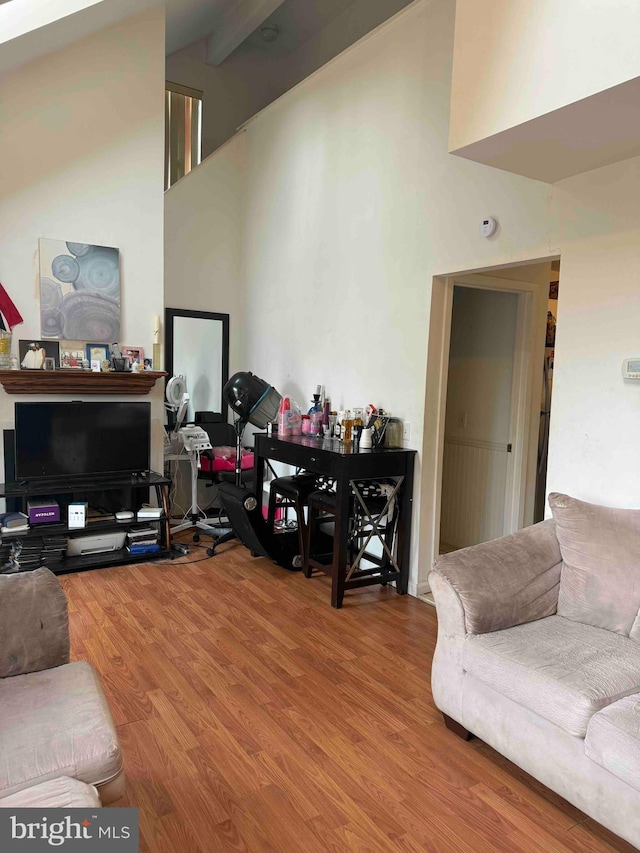 3322 Windermere Dr, Bushkill, PA 18324 - living room with a towering ceiling and wood finished floors