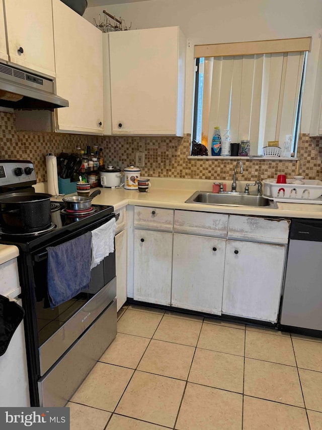 3322 Windermere Dr, Bushkill, PA 18324 - kitchen featuring under cabinet range hood, stainless steel appliances, light countertops, and a sink