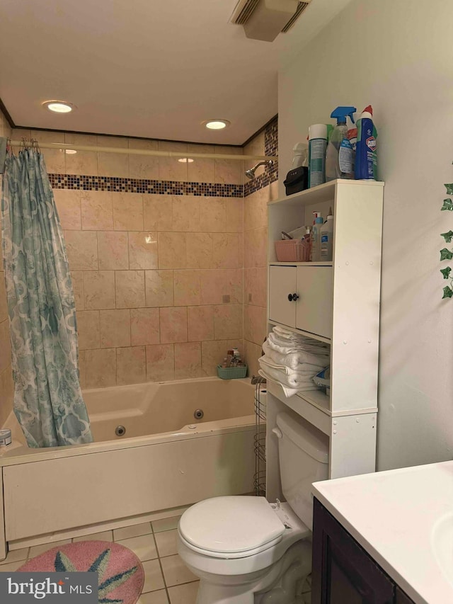 3322 Windermere Dr, Bushkill, PA 18324 - bathroom with tile patterned floors, visible vents, a combined bath / shower with jetted tub, vanity, and toilet