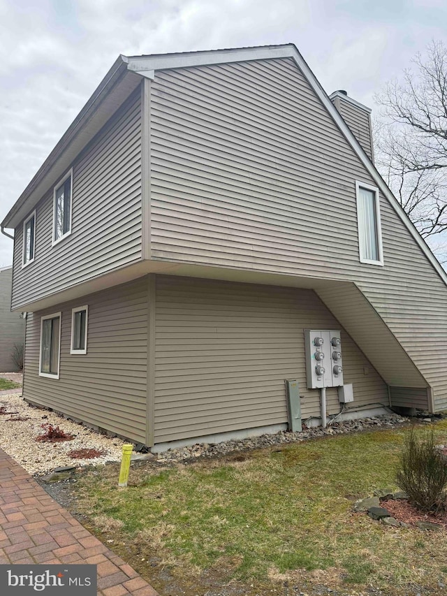 3322 Windermere Dr, Bushkill, PA 18324 - view of side of property with a chimney