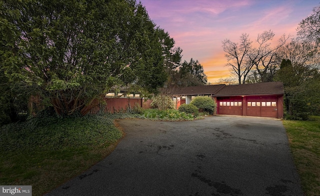 view of front facade featuring driveway and a garage