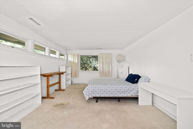 bedroom featuring carpet and visible vents