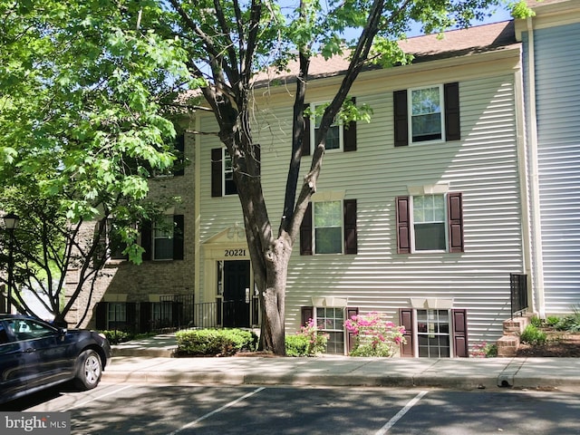 view of front of home with uncovered parking