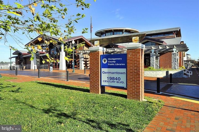 surrounding community with a lawn