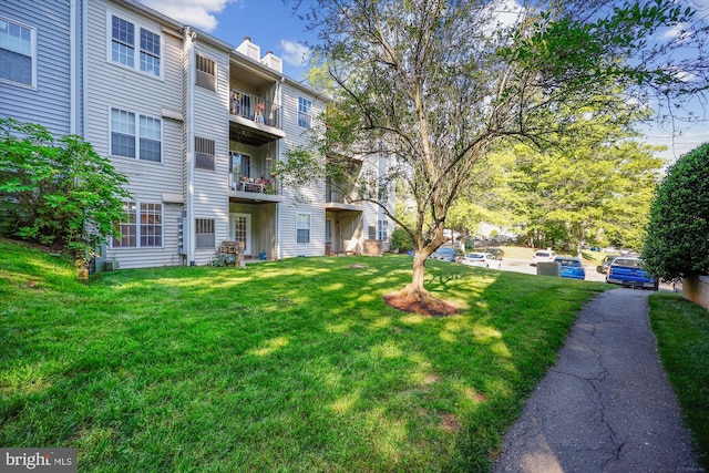 view of community featuring a lawn