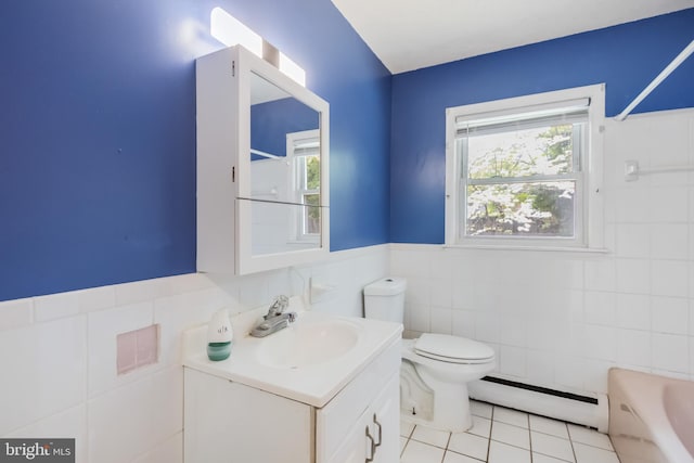 full bathroom with baseboard heating, a tub to relax in, tile walls, toilet, and tile patterned flooring