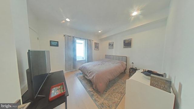 702 N Front St Unit 2, Philadelphia, PA 19123 - bedroom with wood finished floors and recessed lighting