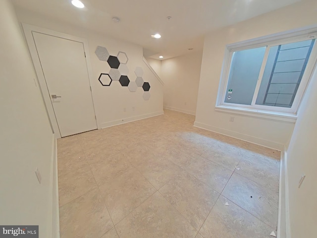 702 N Front St Unit 2, Philadelphia, PA 19123 - tiled spare room with recessed lighting and baseboards