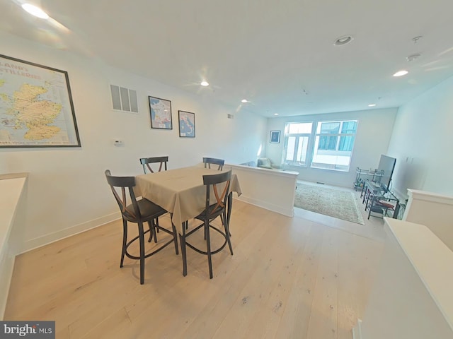 702 N Front St Unit 2, Philadelphia, PA 19123 - dining room with baseboards, recessed lighting, visible vents, and light wood-style flooring