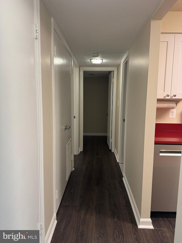 803 N Howard St Unit 435, Alexandria, VA 22304 - corridor featuring dark wood-style floors and baseboards