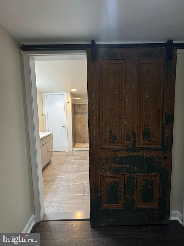 803 N Howard St Unit 435, Alexandria, VA 22304 - full bath with vanity, baseboards, and a shower