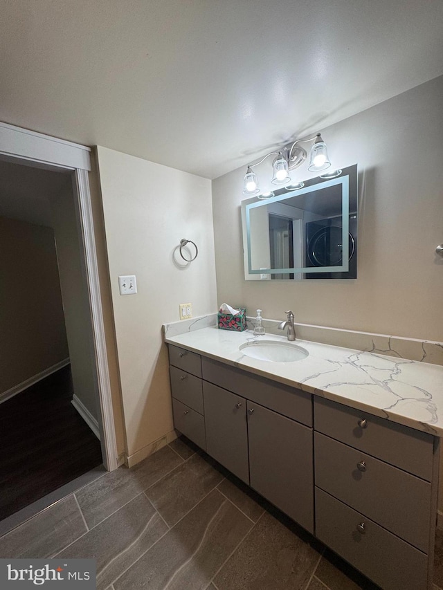 803 N Howard St Unit 435, Alexandria, VA 22304 - bathroom featuring vanity and baseboards