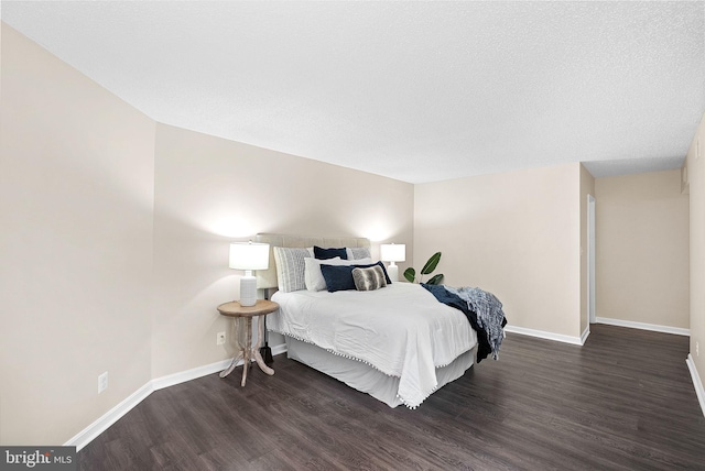 803 N Howard St Unit 435, Alexandria, VA 22304 - bedroom featuring wood finished floors and baseboards