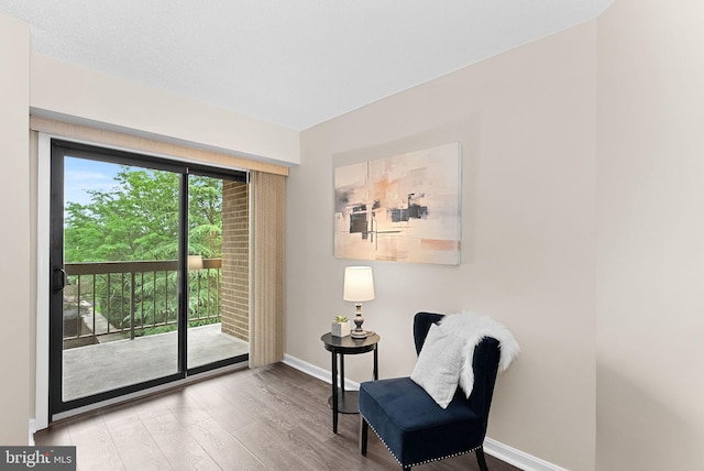 803 N Howard St Unit 435, Alexandria, VA 22304 - sitting room with wood finished floors and baseboards