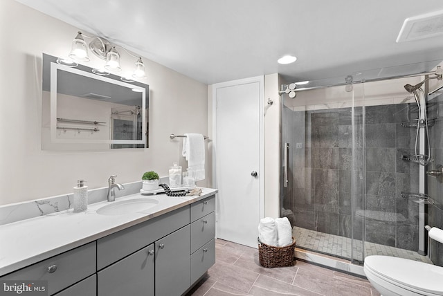803 N Howard St Unit 435, Alexandria, VA 22304 - full bathroom featuring vanity, a shower stall, and toilet