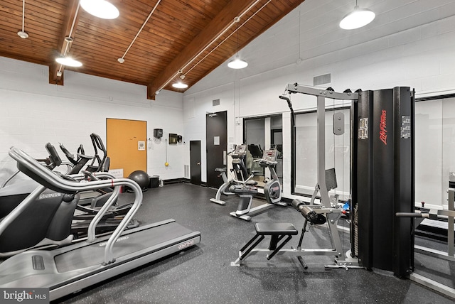 803 N Howard St Unit 435, Alexandria, VA 22304 - workout area with wooden ceiling with exposed beams and concrete block wall