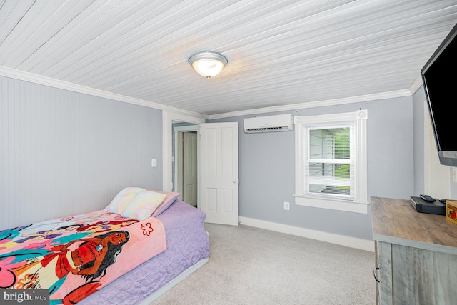 bedroom featuring carpet flooring, an AC wall unit, baseboards, and ornamental molding