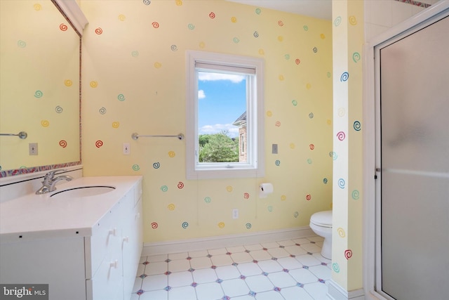 2800 Deer Leap Ln, York, PA 17403 - bathroom with vanity, a shower stall, toilet, wallpapered walls, and tile patterned floors