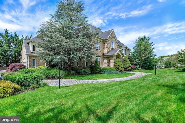 2800 Deer Leap Ln, York, PA 17403 - view of front facade featuring a front yard and brick siding