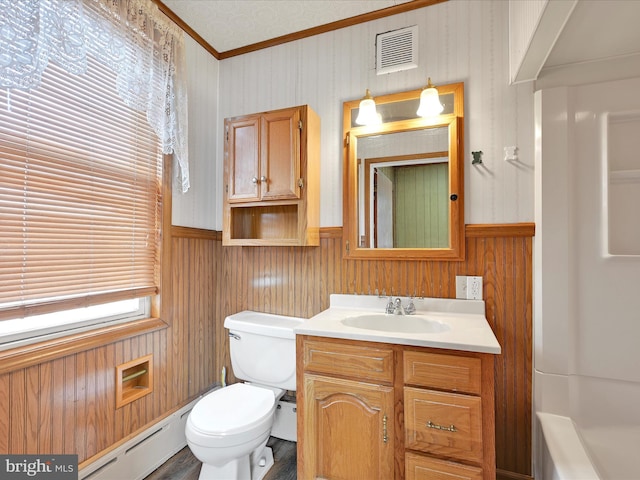 full bath featuring crown molding, wainscoting, vanity, toilet, and visible vents