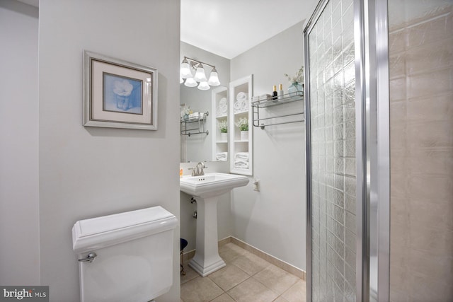 7185 Rivers Edge Rd, Columbia, MD 21044 - bathroom featuring tile patterned flooring, a notable chandelier, and toilet