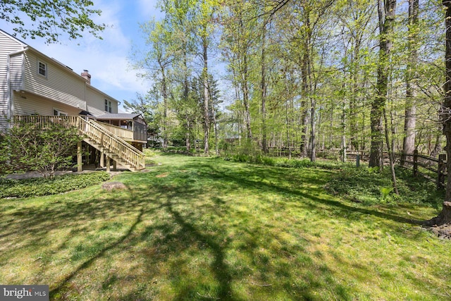 7185 Rivers Edge Rd, Columbia, MD 21044 - view of yard featuring a wooden deck and stairs