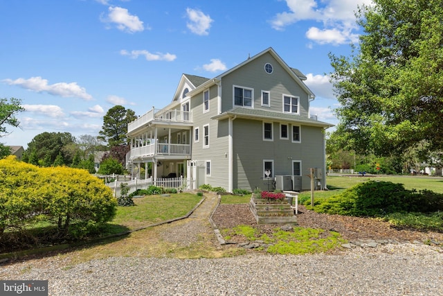 30602 Sandy Landing Rd, Dagsboro, DE 19939 - back of house with a yard, central AC, fence, and a balcony