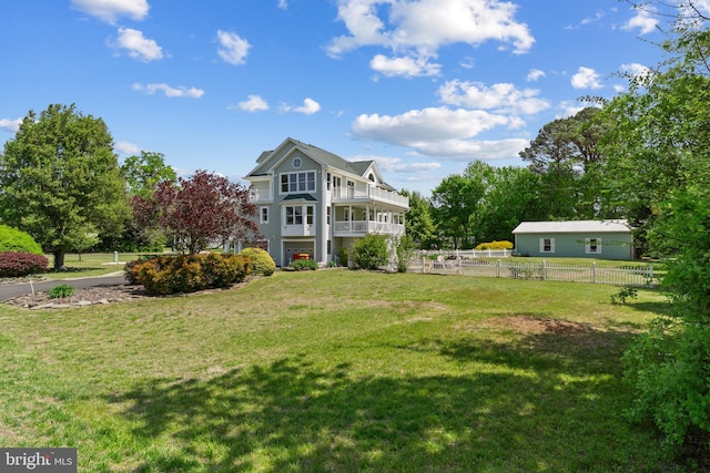 30602 Sandy Landing Rd, Dagsboro, DE 19939 - back of house with a yard, fence, and a balcony