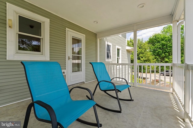 30602 Sandy Landing Rd, Dagsboro, DE 19939 - view of patio featuring covered porch