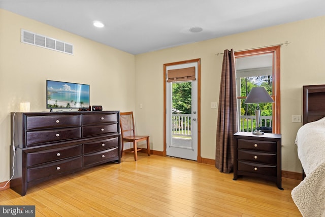 30602 Sandy Landing Rd, Dagsboro, DE 19939 - bedroom featuring baseboards, access to outside, light wood finished floors, and visible vents