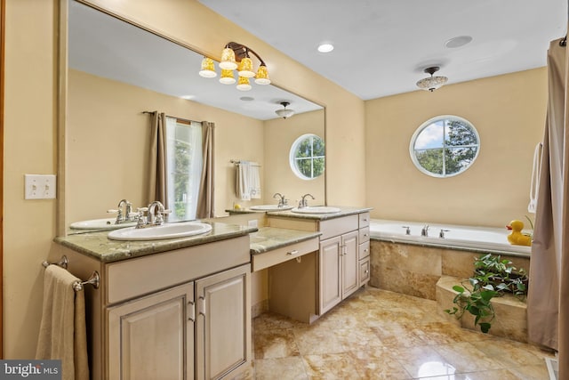 30602 Sandy Landing Rd, Dagsboro, DE 19939 - bathroom featuring two vanities, plenty of natural light, and a sink