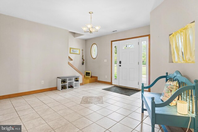 30602 Sandy Landing Rd, Dagsboro, DE 19939 - entrance foyer featuring stairs, baseboards, a chandelier, and light tile patterned floors
