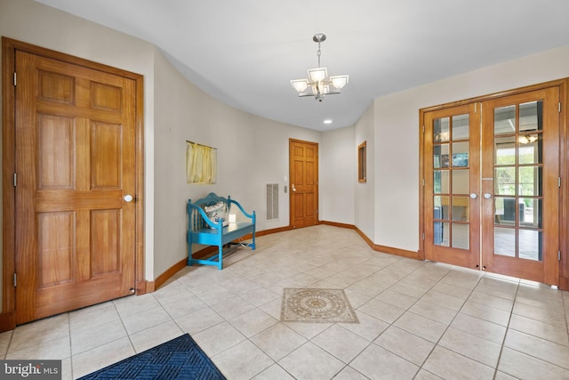 30602 Sandy Landing Rd, Dagsboro, DE 19939 - entryway featuring baseboards, visible vents, french doors, and a notable chandelier