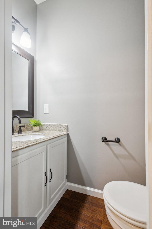 3723 Hampton Ct, Alexandria, VA 22306 - half bath featuring vanity and wood finished floors