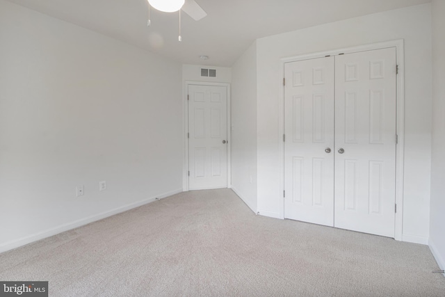 15916 Aerial View Rd, Woodbridge, VA 22193 - unfurnished bedroom featuring carpet, a closet, baseboards, and a ceiling fan