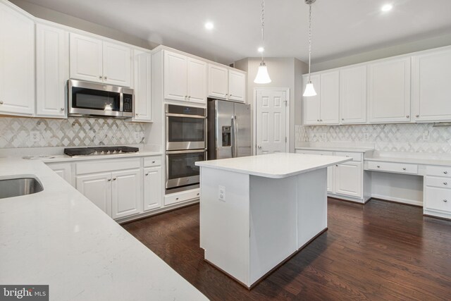 15916 Aerial View Rd, Woodbridge, VA 22193 - kitchen with stainless steel appliances, backsplash, recessed lighting, and white cabinetry