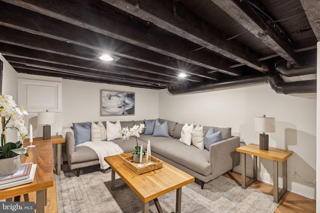 living room with light wood-style flooring and baseboards