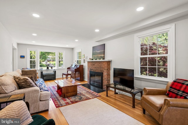 living room featuring recessed lighting and light wood-type flooring